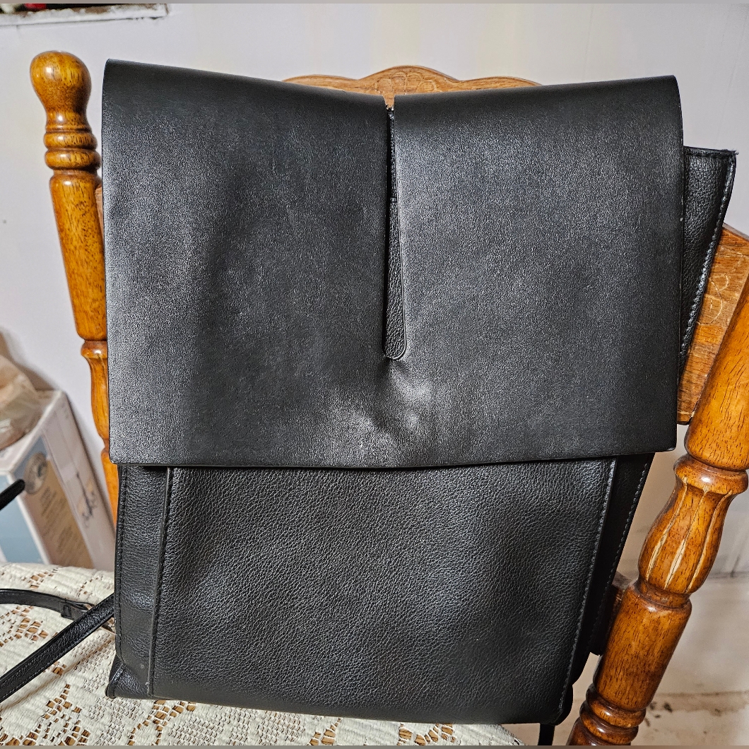 Carin Wester Leather Backpack. New Condition. Lots Of Pockets. Magnet Closure